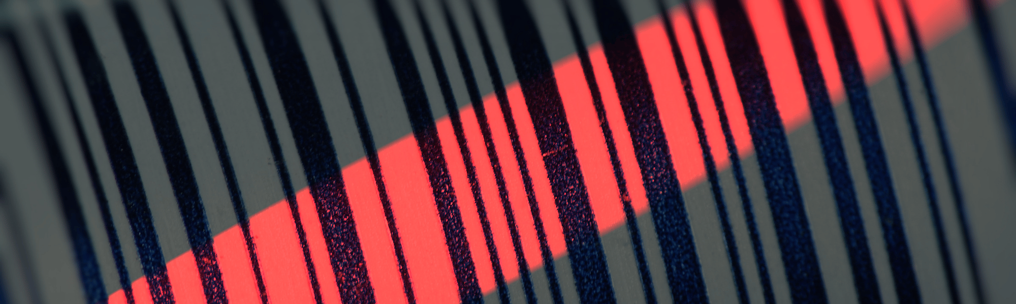 Lecture industrielle d'un code-barres par un faisceau rouge